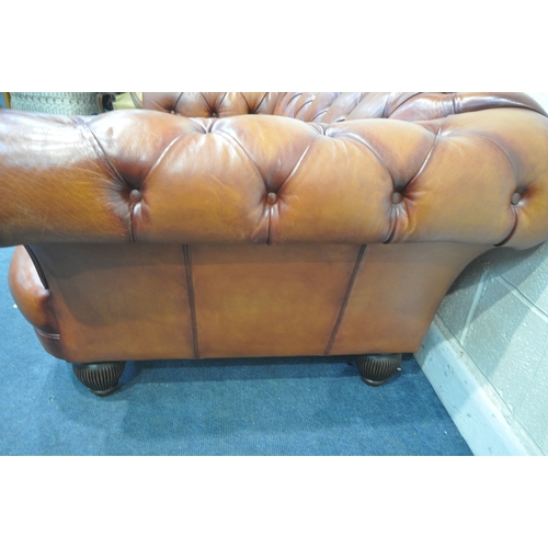 1323 - AN OSKAR TETRAD BUTTONED TANNED LEATHER CHESTERFIELD THREE SEATER SOFA, length 206cm x depth 107cm x... 