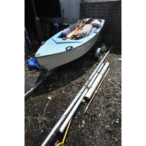 1005 - A 11FT SAILING BOAT, with a 500cm height sail, with a large quantity of parts and accessories includ... 