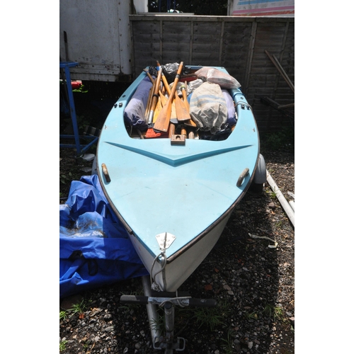 1005 - A 11FT SAILING BOAT, with a 500cm height sail, with a large quantity of parts and accessories includ... 