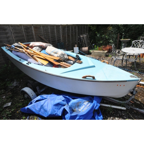 1005 - A 11FT SAILING BOAT, with a 500cm height sail, with a large quantity of parts and accessories includ... 