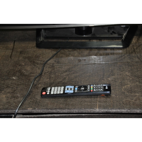 1105 - A LG 37LS570T 37in SMART TV with remote  (PAT pass and working) along with a Toshiba DVD /Video and ... 