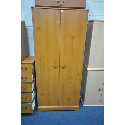 1202 - A SELECTION OF MATCHING PINE EFFECT MODERN BEDROOM FURNITURE, to include a 2 door wardrobe, width 78... 