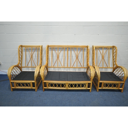 1207 - A WICKER FRAMED THREE PIECE CONSERVATORY SUITE, comprising a two seater sofa and two chairs, width 1... 