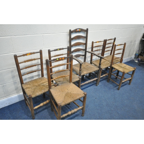 1212 - A SET OF SIX 20TH CENTURY OAK RUSH SEATED LADDERBACK CHAIRS, along with a single carver (condition -... 