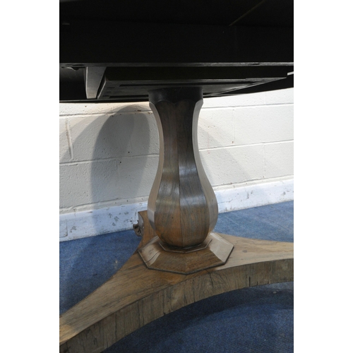 1224 - A 19TH CENTURY ROSEWOOD TILT TOP CIRCULAR BREAKFAST TABLE, on a bulbous column and triform base, wit... 