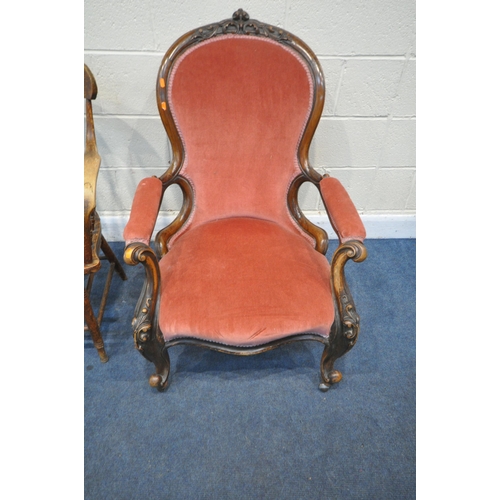 1229 - A VICTORIAN WALNUT SPOON BACK OPEN ARMCHAIR, with foliate carved cresting, pink upholstered back, se... 