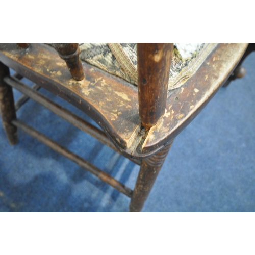 1229 - A VICTORIAN WALNUT SPOON BACK OPEN ARMCHAIR, with foliate carved cresting, pink upholstered back, se... 