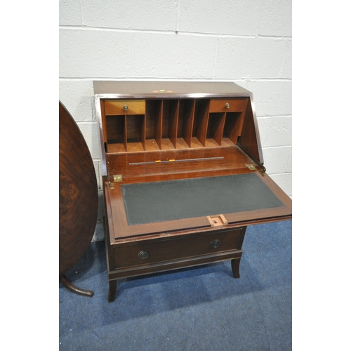 1244 - A 20TH CENTURY MAHOGANY BUREAU, the fall front door enclosing a fitted interior, above three drawers... 