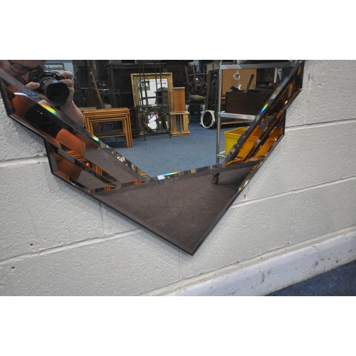 1248 - AN ART DECO STYLE WALL MIRROR, with a metal frame, one large mirror section and five various rose go... 