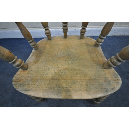 1254 - A 20TH CENTURY BEECH CAPTAINS CHAIR, width 68cm x depth 55cm x height 82cm (condition - ideal for re... 