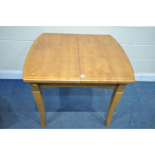 1259 - A MODERN BEECH EFFECT EXTENDING DINING TABLE, with a single fold out leaf, open length 131cm x close... 