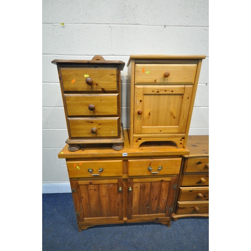 1263 - A SELECTION OF MODERN PINE FURNITURE, to include a chest of two short over three long drawers, width... 