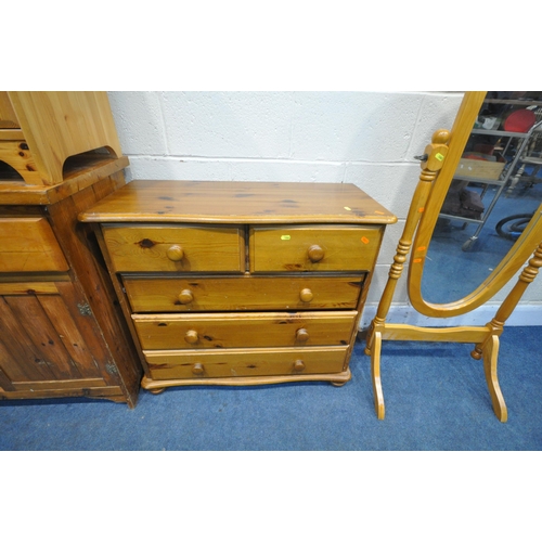 1263 - A SELECTION OF MODERN PINE FURNITURE, to include a chest of two short over three long drawers, width... 