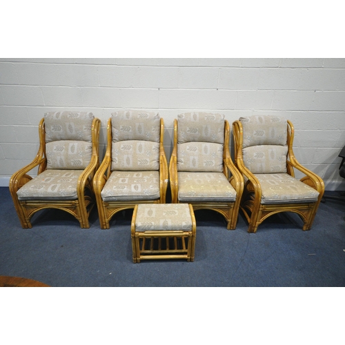 1269 - FOUR WICKER CONSERVATORY ARMCHAIRS, and a stool, all with beige upholstery (condition - general wear... 