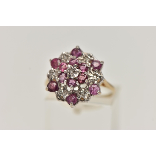 10 - A 9CT GOLD RUBY AND DIAMOND CLUSTER RING, designed as a tiered cluster of single cut diamonds and ci... 