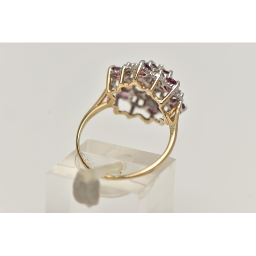 10 - A 9CT GOLD RUBY AND DIAMOND CLUSTER RING, designed as a tiered cluster of single cut diamonds and ci... 