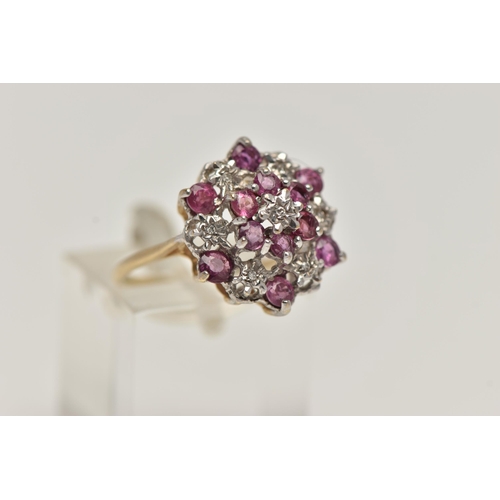 10 - A 9CT GOLD RUBY AND DIAMOND CLUSTER RING, designed as a tiered cluster of single cut diamonds and ci... 