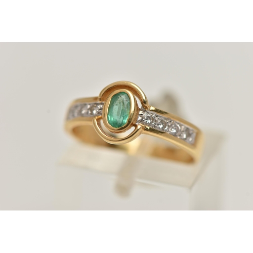 12 - AN 18CT GOLD EMERALD AND DIAMOND RING, designed as a central oval emerald flanked by brilliant cut d... 