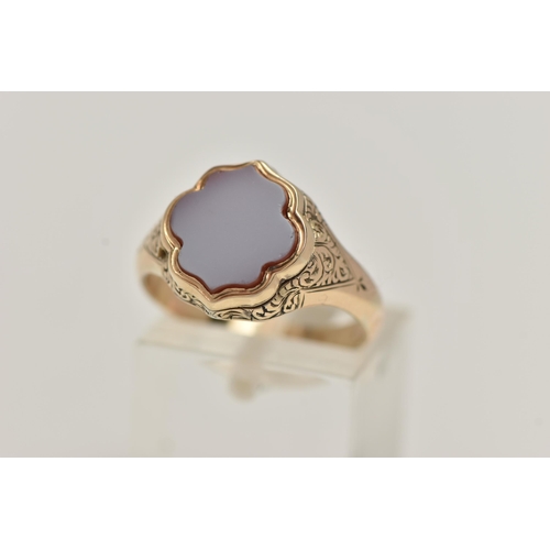 13 - A LATE VICTORIAN MEMORIAL RING, the scalloped shape front set with carnelian, opening to reveal a va... 
