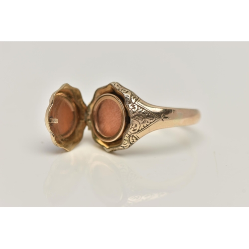 13 - A LATE VICTORIAN MEMORIAL RING, the scalloped shape front set with carnelian, opening to reveal a va... 