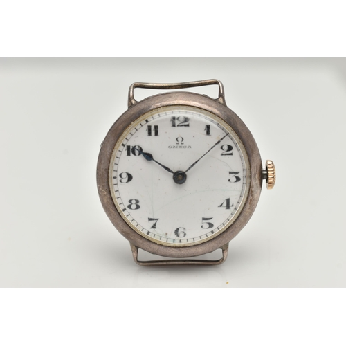 16 - AN EARLY 20TH CENTURY SILVER 'OMEGA' WATCH HEAD, manual wind requires some attention, round white di... 