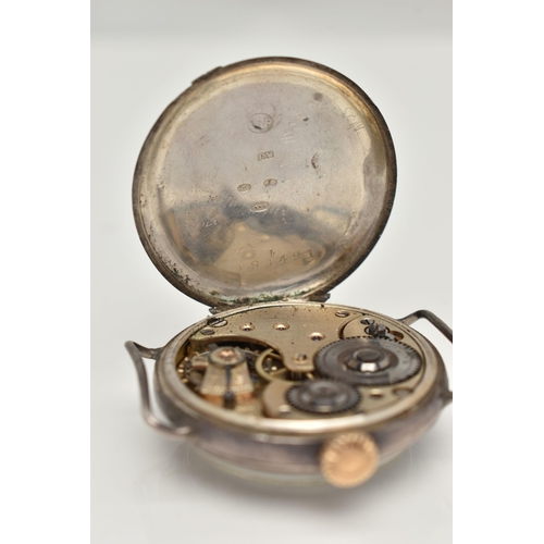 16 - AN EARLY 20TH CENTURY SILVER 'OMEGA' WATCH HEAD, manual wind requires some attention, round white di... 