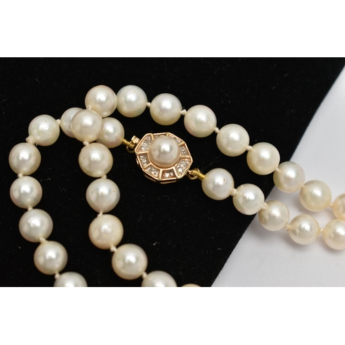 17 - A CULTURED PEARL NECKLACE, each pearl individually knotted on a white string, each pearl measures ap... 