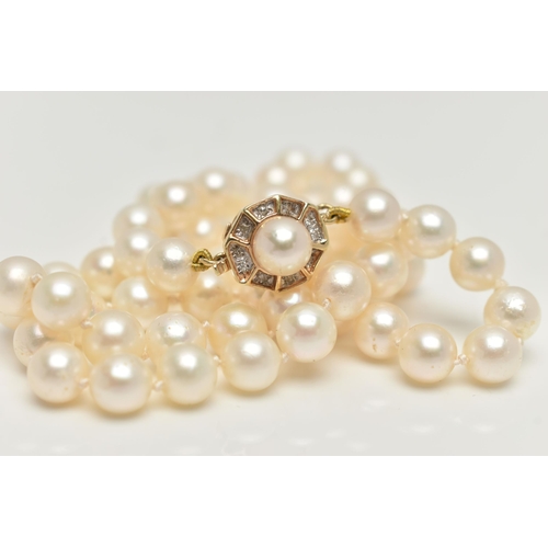 17 - A CULTURED PEARL NECKLACE, each pearl individually knotted on a white string, each pearl measures ap... 