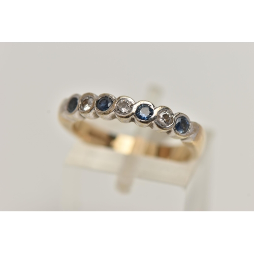 22 - A 9CT GOLD SAPPHIRE AND DIAMOND HALF ETERNITY RING, designed with four circular cut blue sapphires, ... 