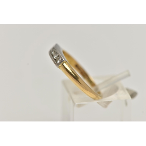 27 - AN 18CT GOLD FIVE STONE DIAMOND RING, five channel set, round brilliant cut diamonds, estimated tota... 