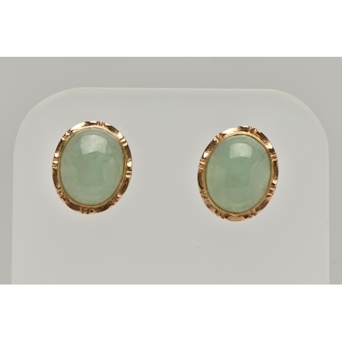 33 - A PAIR OF YELLOW METAL JADE STUD EARRINGS, of an oval form, set with an oval cut jade cabochon, coll... 