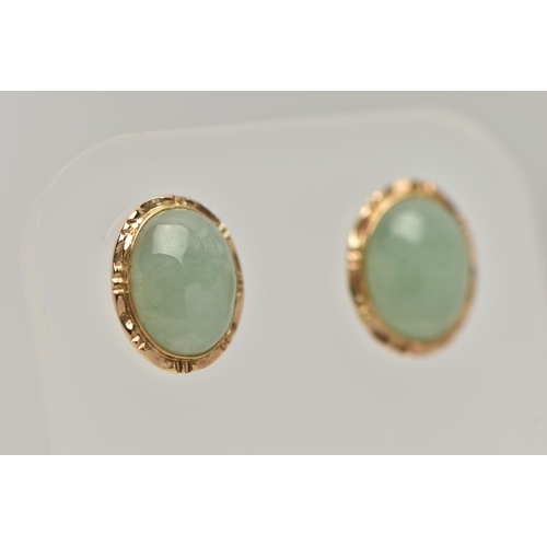 33 - A PAIR OF YELLOW METAL JADE STUD EARRINGS, of an oval form, set with an oval cut jade cabochon, coll... 