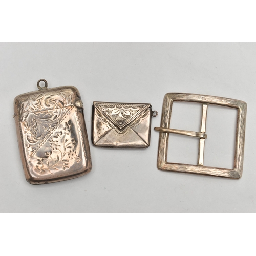 36 - A SILVER VESTA CASE, STAMP HOLDER AND A BELT BUCKLE, the rounded rectangular vesta case, decorated w... 