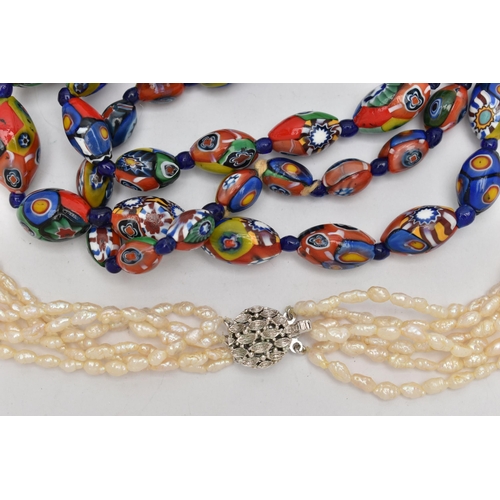 41 - A CULTURED PEARL NECKLACE AND A MILLEFIORI BEAD NECKLACE, six strands of baroque pearls, fitted with... 