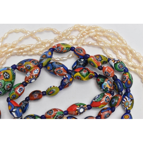 41 - A CULTURED PEARL NECKLACE AND A MILLEFIORI BEAD NECKLACE, six strands of baroque pearls, fitted with... 