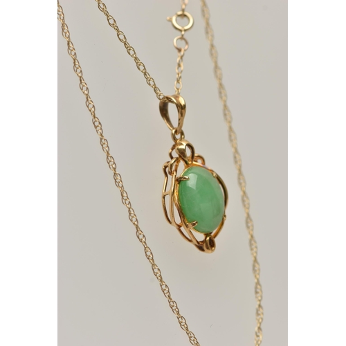 5 - A GEM SET PENDANT AND CHAIN, the oval jade cabochon in a four claw setting with a scrolling surround... 