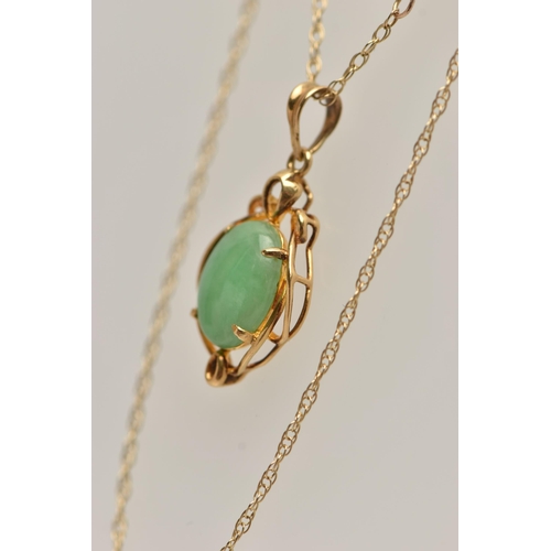 5 - A GEM SET PENDANT AND CHAIN, the oval jade cabochon in a four claw setting with a scrolling surround... 