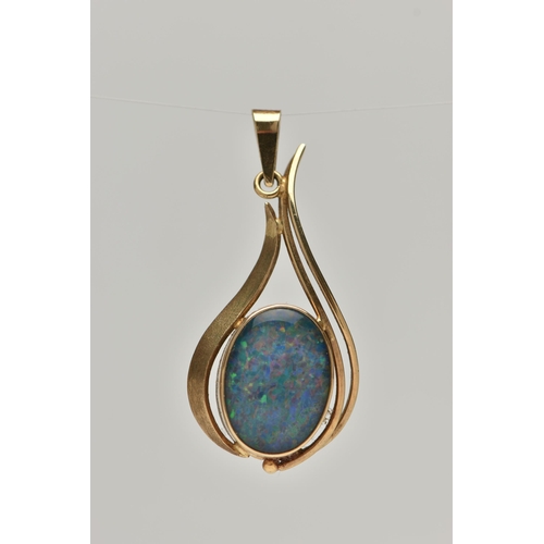 6 - A GEM PENDANT, designed as an oval opal triplet in a collet setting with abstract pear shape surroun... 