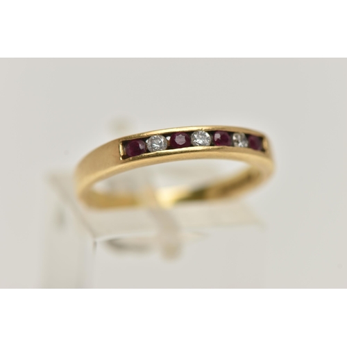 7 - AN 18CT GOLD RUBY AND DIAMOND SEVEN STONE RING, designed as four circular rubies interspaced by thre... 
