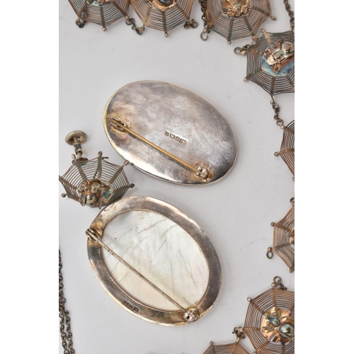 80 - TWO SILVER 'DAVID SCOTT-WALKER' MOTHER OF PEARL BROOCHES AND A NECKLACE, two oval mother of pearl br... 