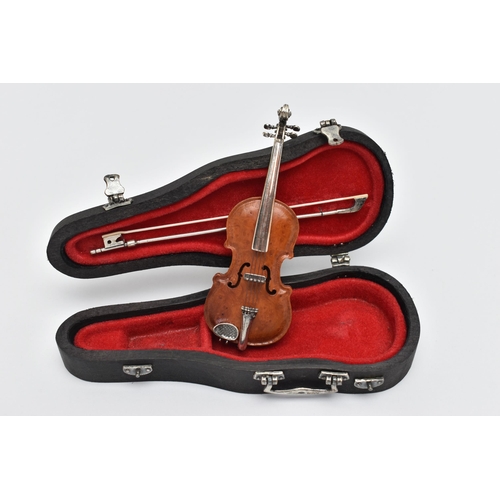 94 - A MINATURE 'SACCHETTI' VIOLIN, a cased violin with silver embellishments, approximate length of case... 