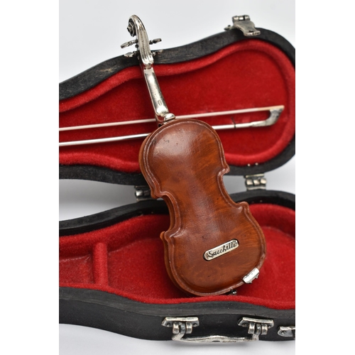94 - A MINATURE 'SACCHETTI' VIOLIN, a cased violin with silver embellishments, approximate length of case... 