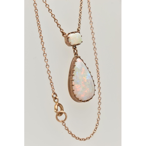 149 - AN OPAL PENDANT NECKLACE, pear cut opal cabochon measuring approximately 22.3mm x 14.4mm, claw set b... 