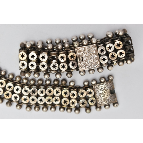 151 - TWO VICTORIAN WHITE METAL BRACELETS, two matching bracelets comprised of two rows of star links and ... 