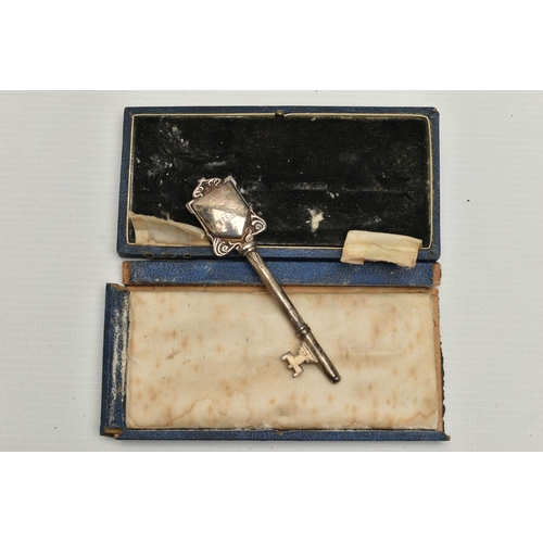 101 - A CASED GEORGE V SILVER PRESENTATION KEY, engraved ' PRESENTED TO MRS W.E. SANGSTER ROUPELL PARK MET... 