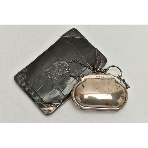 102 - A LATE VICTORIAN SILVER MOUNTED GREEN CROCODILE SKIN WALLET AND A SMALL GEORGE V SILVER PURSE ON CHA... 