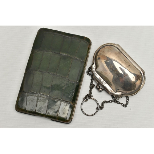 102 - A LATE VICTORIAN SILVER MOUNTED GREEN CROCODILE SKIN WALLET AND A SMALL GEORGE V SILVER PURSE ON CHA... 