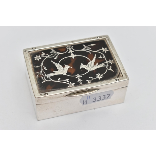 110 - AN EDWARDIAN WILLIAM COMYNS & SONS SILVER PIQUE WORK TRINKET BOX OF RECTANGULAR FORM, two birds amon... 