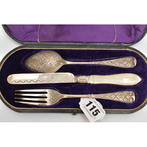 115 - A VICTORIA I SILVER CHRISTENING SET, a silver knife fork and spoon, decorated with bright cut detail... 