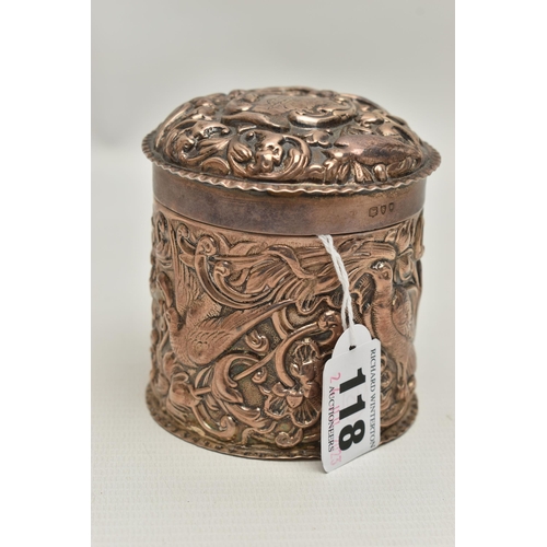 118 - A VICTORIA I EMBOSSED SILVER POT, a cylindrical pot embossed with birds and a floral and foliage des... 